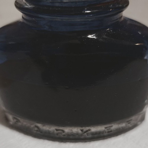 Permanent blue ink "PARKER - SUPER QUINK", in a glass bottle in its box, I think it is full.