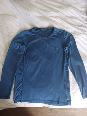 Used shirt size L in good condition