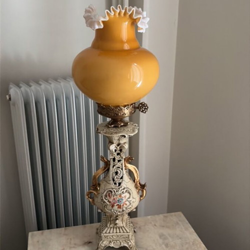 Vintage table lamps used, porcelain base with orange glass shade