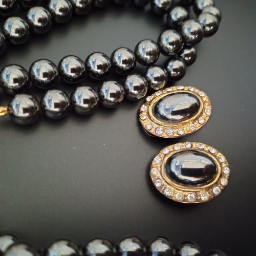 Vintage jewelry set used with black glossy beads and zircon