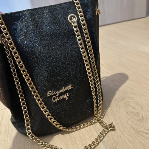 Elizabeth George handbag black with gold chain, like new