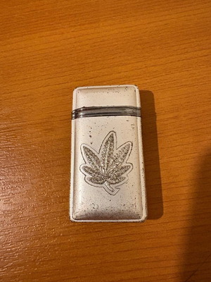 Vintage metal lighter used, without fluid