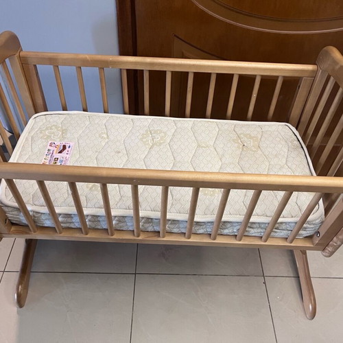 Cradle with orthopedic mattress like new made of natural solid wood