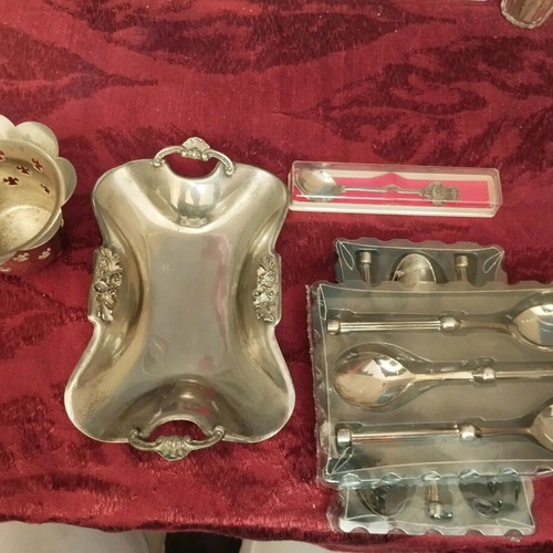 Silver decorative bowls, cup and six spoons used