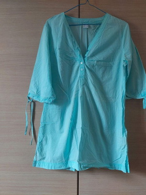 Turquoise shirt used, size Large
