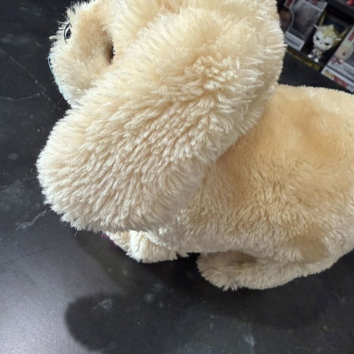 Beige plush dog toy