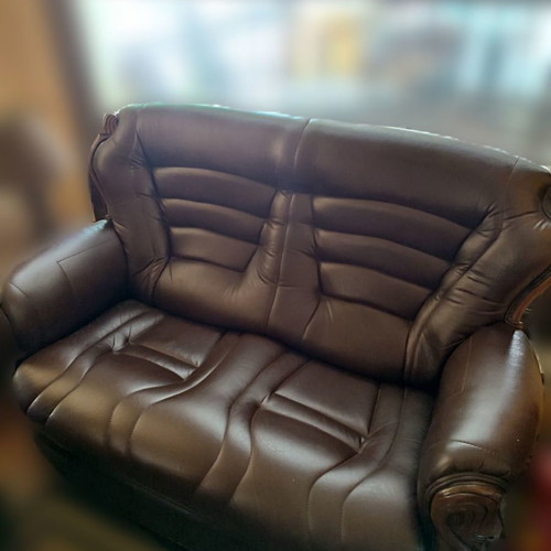 Leather sofa Italian design used, dark brown with wood details
