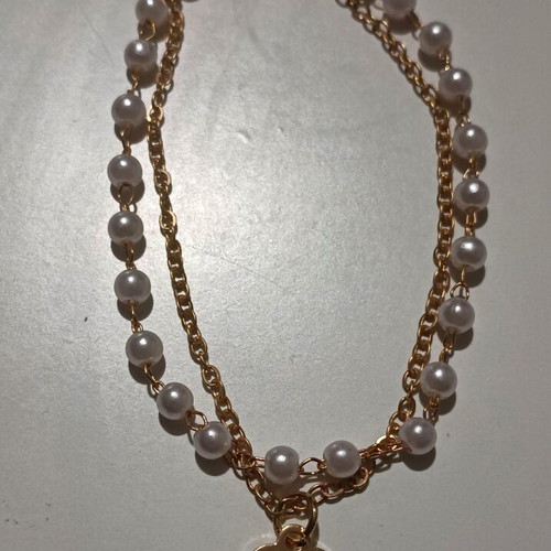 Bracelet new, white and gold-colored