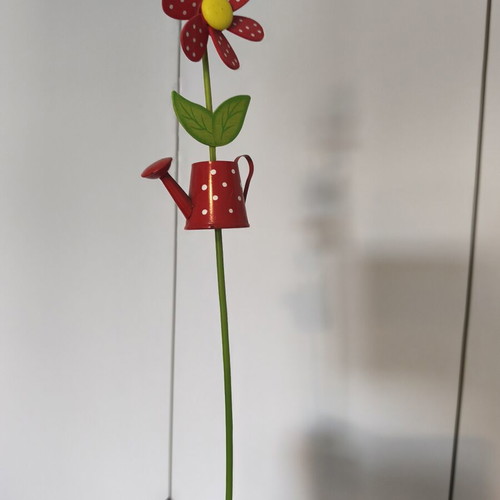 Decorative garden pot flower with wind spinner