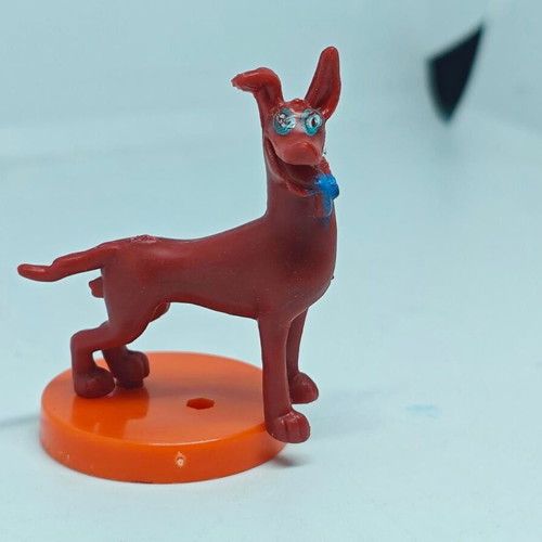Vintage dog figure like new with orange base