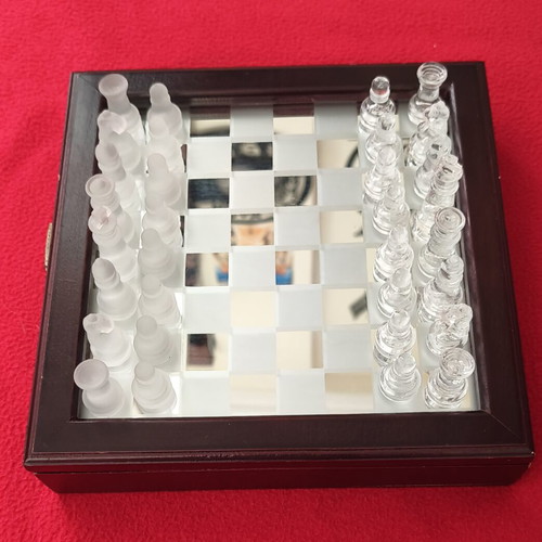 Vintage glass chess set used with wooden case and mirror board