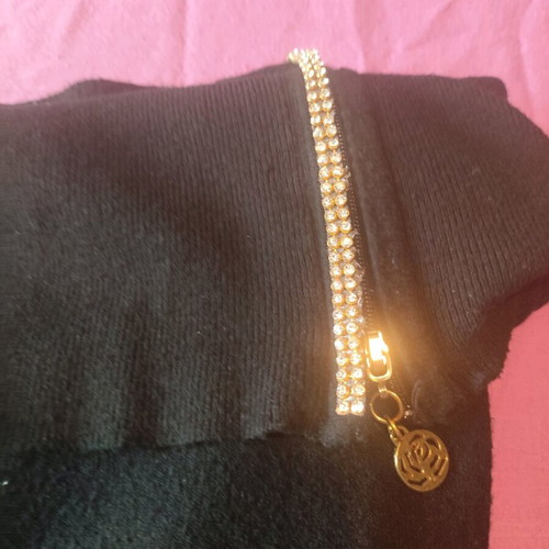 Black knitted dress used with shoulder design, tight fit