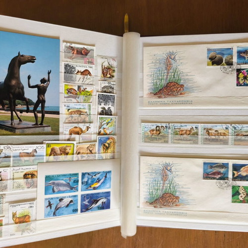 A4 Album 16 Pages with Rich Animal Stamp Collection like new