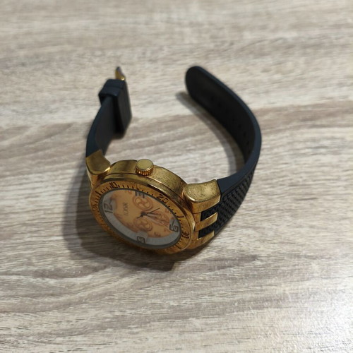 Loisir women's watch gold with black strap like new