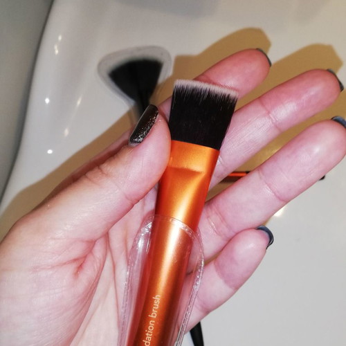 Real Techniques and Avon makeup brush set used