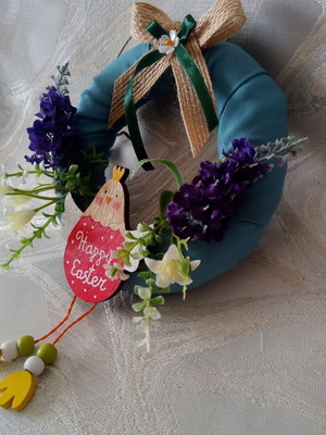 Small May wreath used with wildflowers and wooden chicken