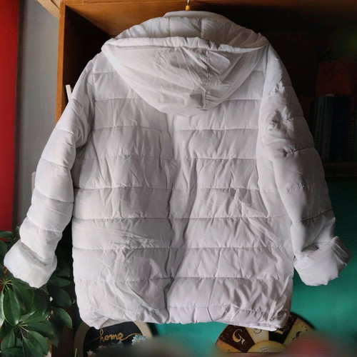 Jacket new size L white, lightweight and warm