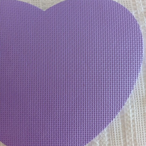 Large heart-shaped foam mat with small duck