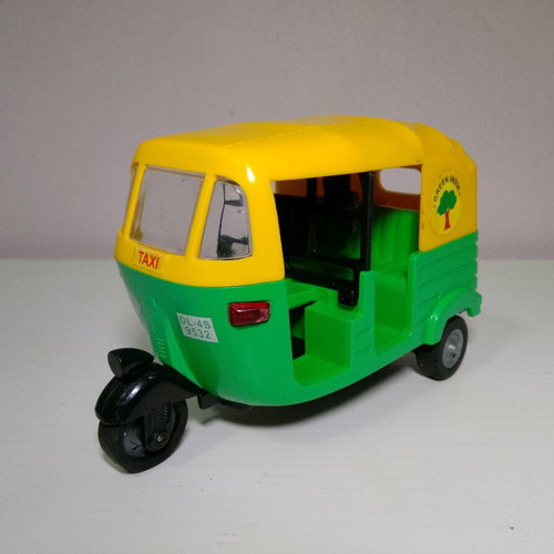 Toy ricksaw TUK TUK used, traditional Indian taxi