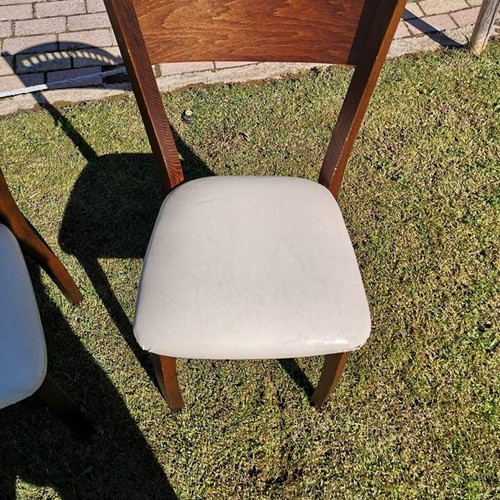 Wooden chair used with beige leather seat dark brown