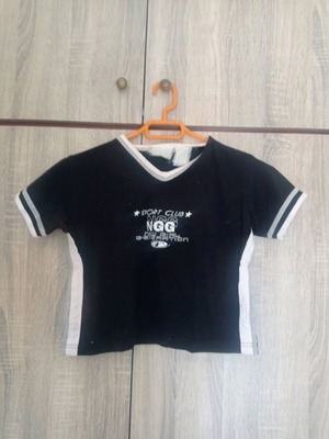 Short top used, size XS, with discoloration