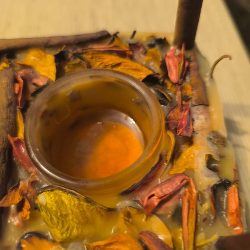 Handmade rectangular candle with aromatic potpourri like new