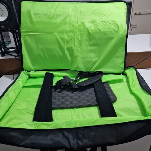Pioneer DDJ-FLX10 DJ controller used with soft case and music collection