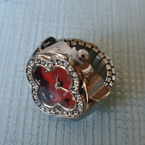 Four-Leaf Clover Ring like new with crystals, quartz watch and red dial