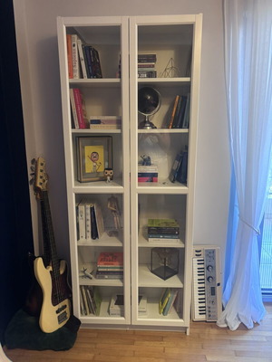 Billy bookcase with glass doors like new