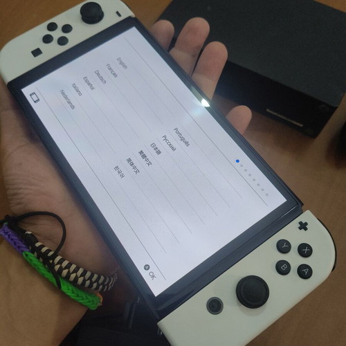 Nintendo Switch OLED white with Mario and Rabbids Kingdom Battle game