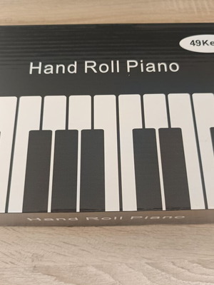 Portable electronic piano