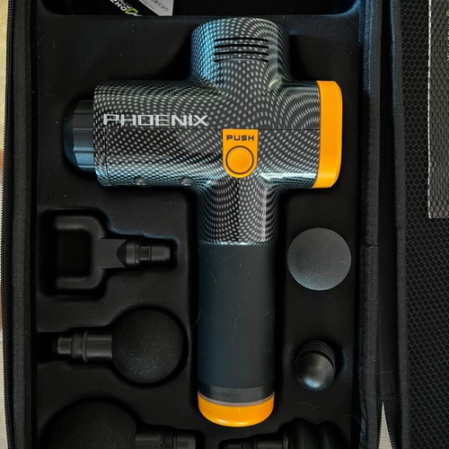 Phoenix massage gun with 6 heads and carrying case like new