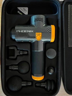 Phoenix massage gun with 6 heads and carrying case like new