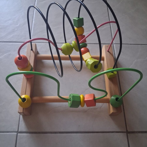 Wooden educational bead maze toy used, Montessori style for infants