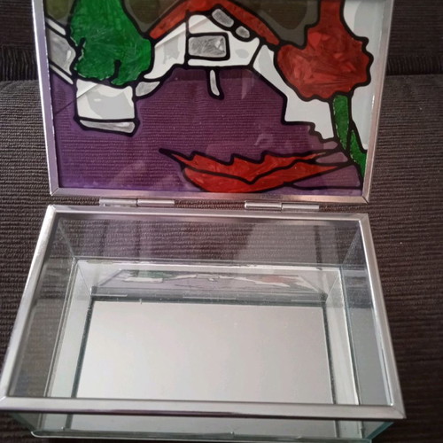 Stained glass jewelry box used with embossed colors and mirror base
