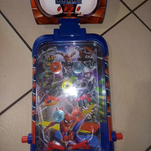 Electronic tabletop pinball used with digital scoring and sound effects