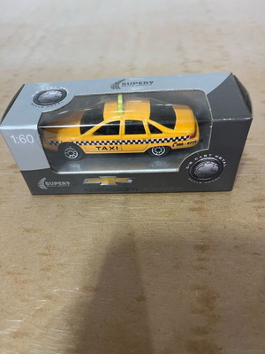 Chevrolet Caprice NY Taxi 1:60 sealed miniature new