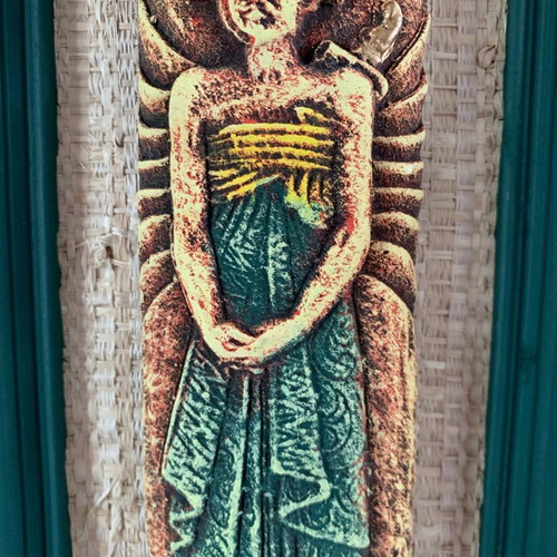 Handmade wooden frames with embossed exotic figures from Bali
