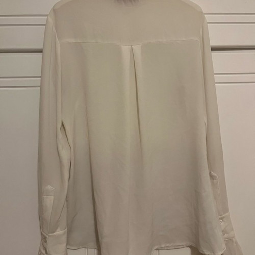Secret white shirt medium used with ruffle sleeves