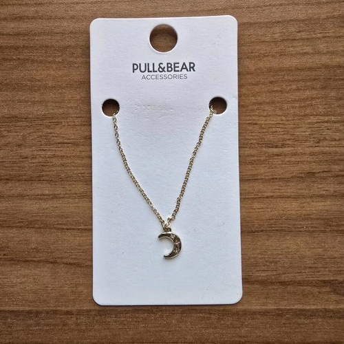 Necklace new, gold color with crescent moon pendant