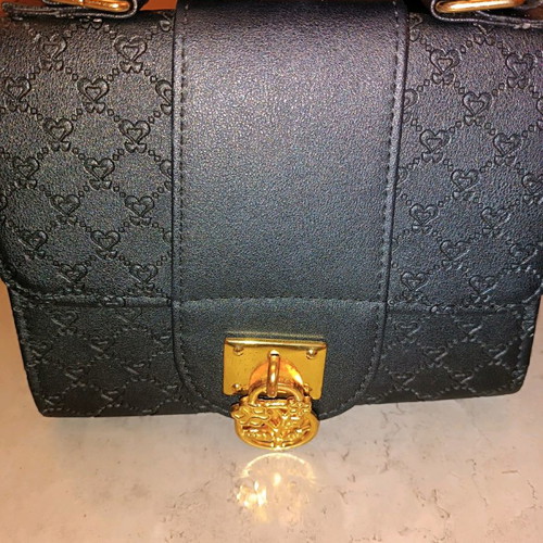 Handbag like new black with metal decoration