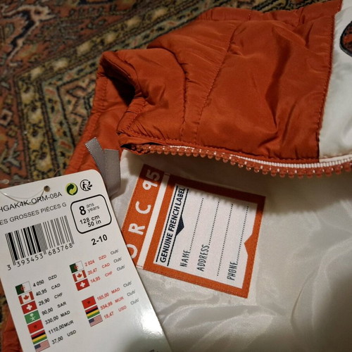 Orchestra sleeveless jacket new for boys 8 years old, orange and white