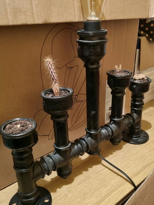 Table lamp used made of pipes