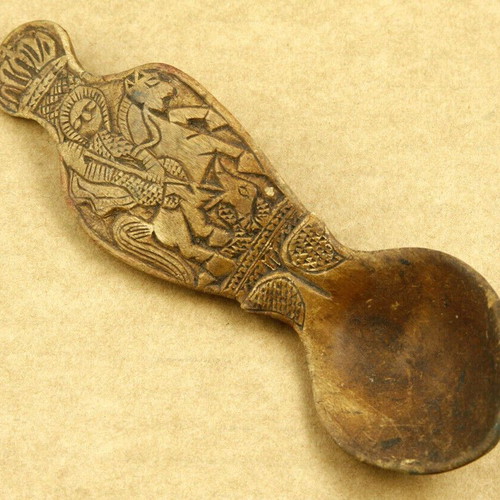 Handmade wooden carved spoon with Saint George used