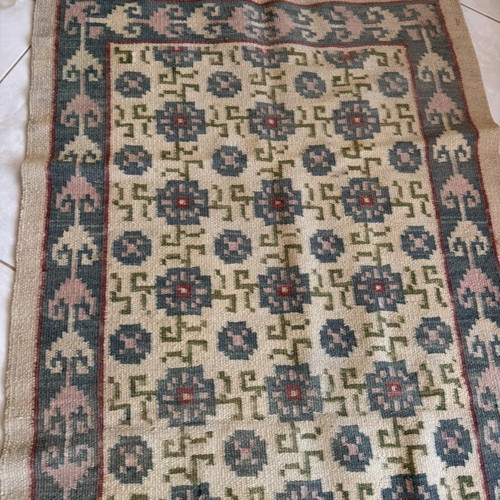 Handwoven rug used, 95 x 182 cm