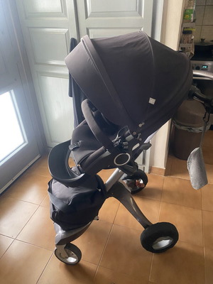 Stokke stroller with newborn cushion and accessories