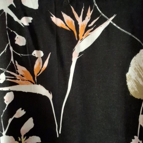ALE top like new, asymmetric, size L, black with patterns