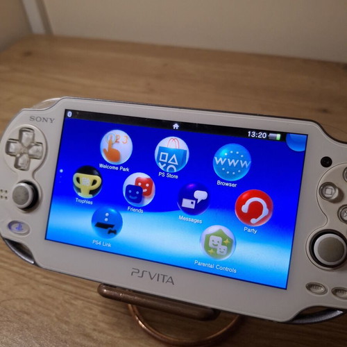 Sony PlayStation Vita 1000 OLED White like new with 8GB card and charging cable