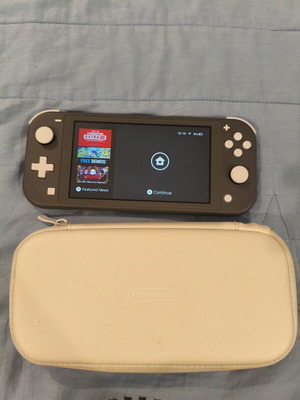 Nintendo Switch Lite 32GB σαν καινούργιο με λευκή θήκη