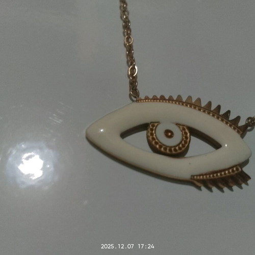 Thin gold-colored necklace used